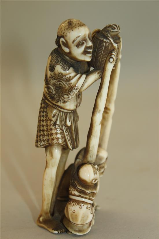 A Japanese ivory okimono of Ashinaga and Tenaga, Meiji period, 10.3cm